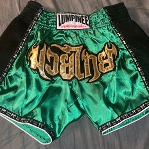Muay Thai boxing shorts size XL never worn fits like a S/M emerald green